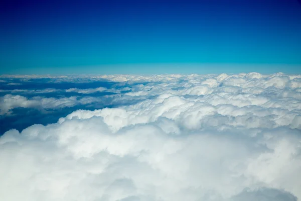 Aerial fluffy clouds view from high like a sea — Stock Photo, Image
