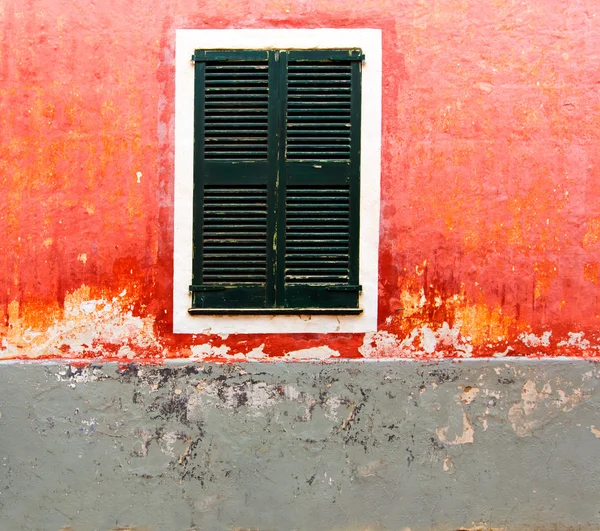 Menorca Ciutadella red grunge facade texture — Stock Image Menorca Ciutadella red grunge facade texture Stock Photo
