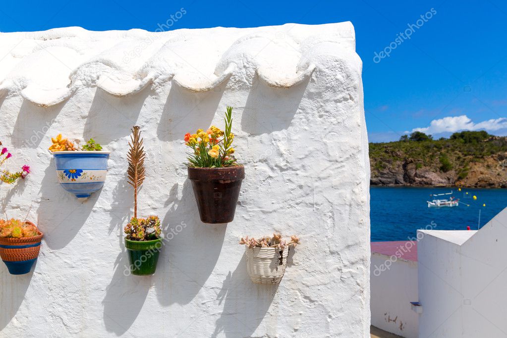 Menorca Es Grau white house flower pots detail in Balearic
