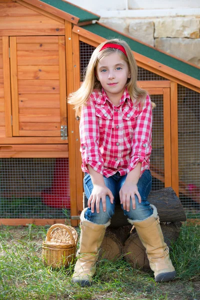 Breeder hens kid girl rancher farmer sitting in chicken tractor — Stock Photo, Image