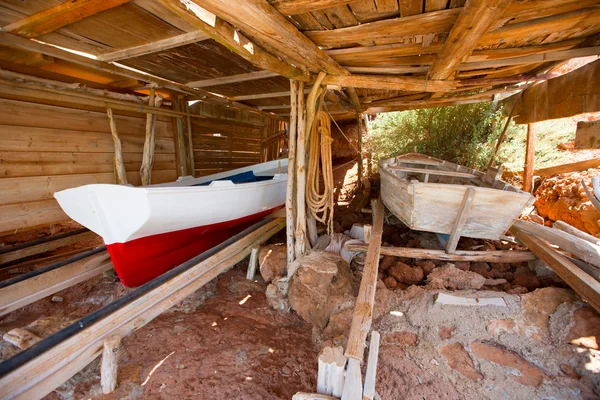 Formentera Cala Saona beach rail beached boats — Stock Photo, Image