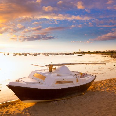 Boat sunset Estany des Peix in Formentera Balearic Island clipart