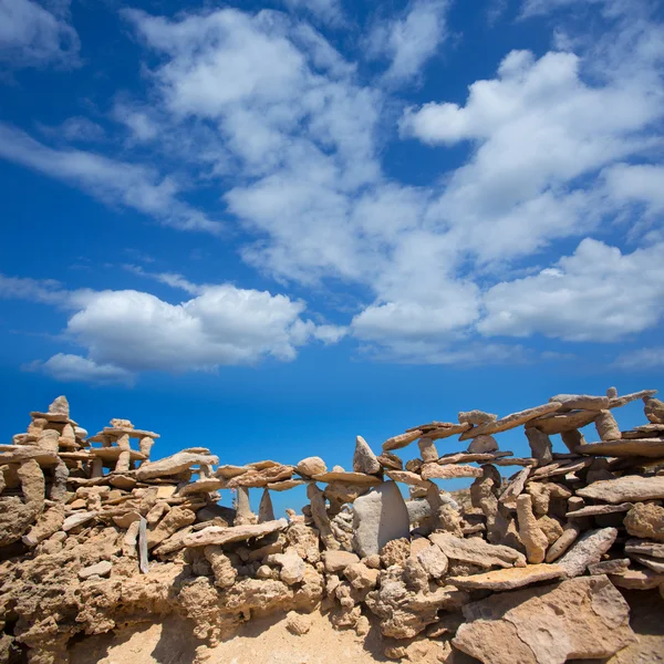 Stone figures on beach shore of Illetes beach in Formentera — Stock Photo, Image