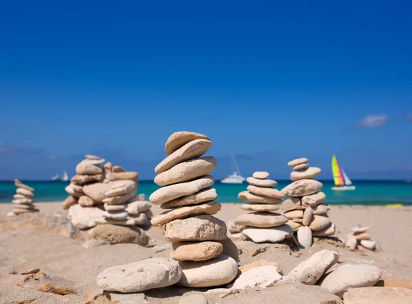 Stone figures on beach shore of Illetes beach in Formentera — Stock Photo, Image