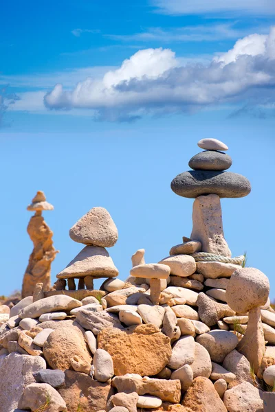 Stone figures on beach shore of Illetes beach in Formentera — Stock Photo, Image