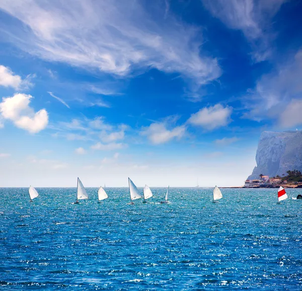 Sailboats Optimist learning to sail in Mediterranean at Denia — Stock Photo, Image