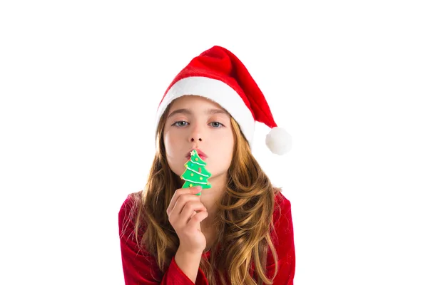 Christmas kid girl kissing Xmas tree cookie — Stock Photo, Image