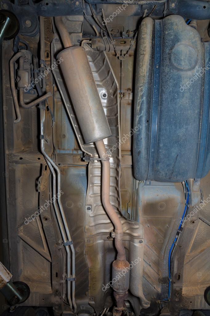 Car underbody exhaust pipe fuel tank Stock Photo by ©lunamarina 42209037