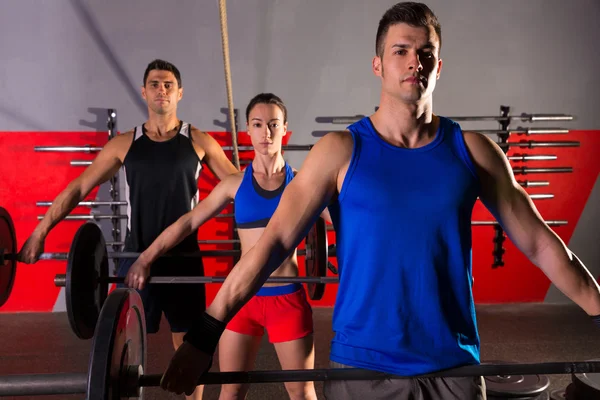 Skivstång styrketräning grupp träning träning gym — Stockfoto