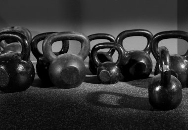 Kettlebells weights in a workout gym