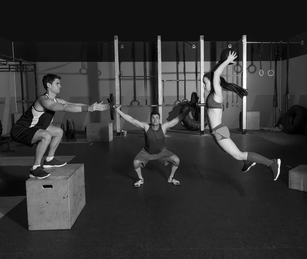 Gym group workout barbells slam balls and jump — Stock Photo, Image