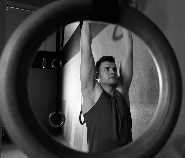 Rings workout man at gym hanging — Stock Photo, Image