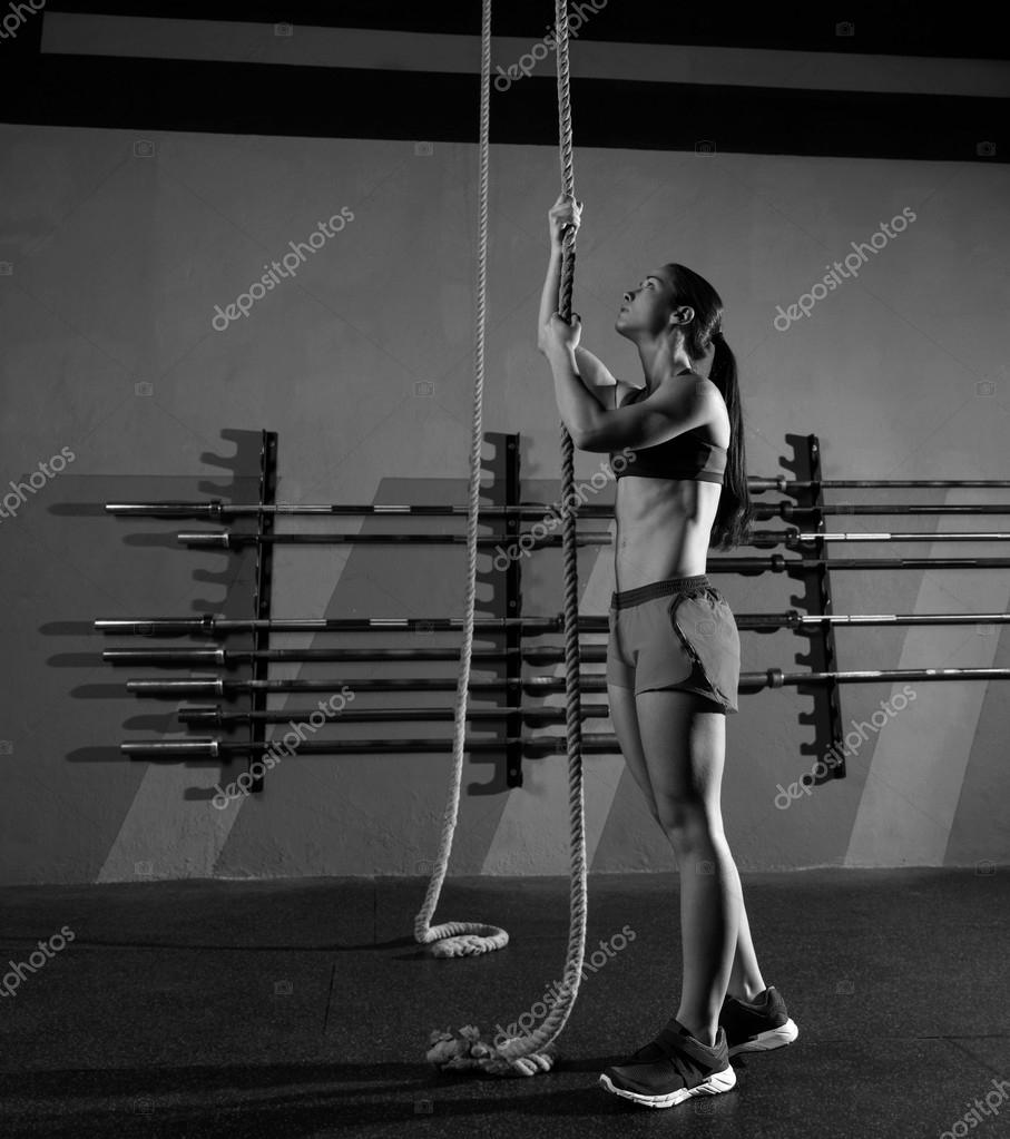 Rope Climb exercise woman workout at gym — Stock Photo © lunamarina  #44287513