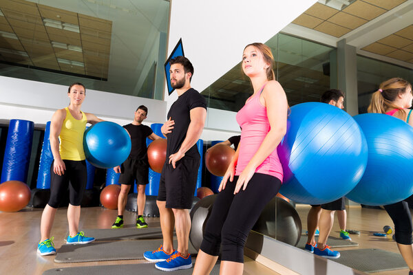 Gym people group relaxed after fitball training