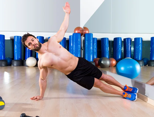 Fitness side push ups man pushup at gym — Stock Photo, Image