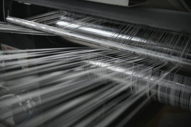 Fabrikaların dokuma makineleri. Tekstil üretimi.
