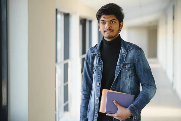 Handsome and young indian Male college student.