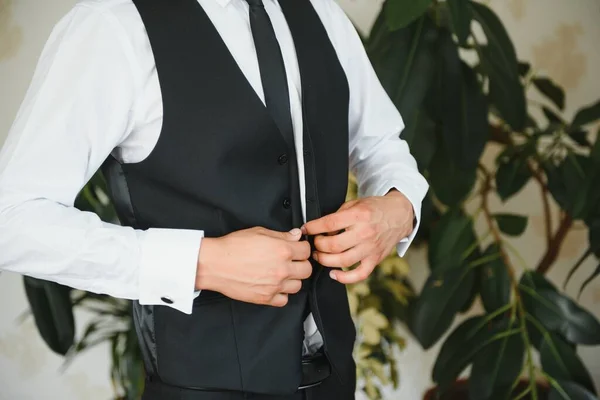 Man Fastens Buttons His Shirt — Stock Photo, Image