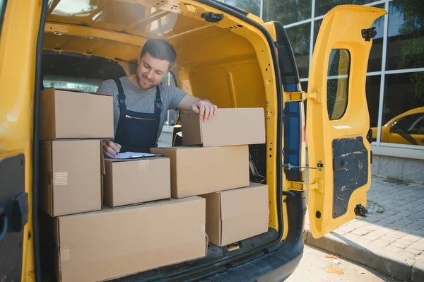 Deliveries All Running Schedule Portrait Delivery Man Unloading Boxes His — Stock Photo, Image