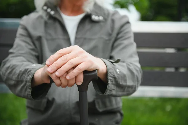 Portrait Senior Man Holding Walking Stick While Resting Park — Stock Photo, Image