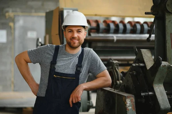 Factory worker. Man working on the production line