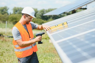 A man working at solar power station