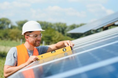 A man working at solar power station