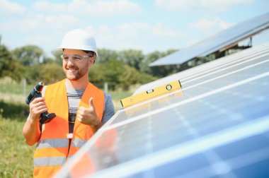 A man working at solar power station