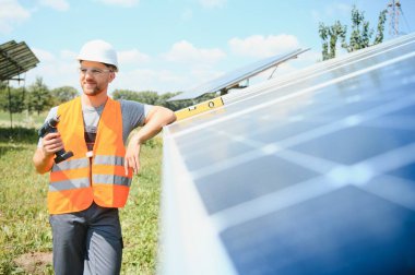 A man working at solar power station