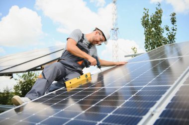 A man working at solar power station