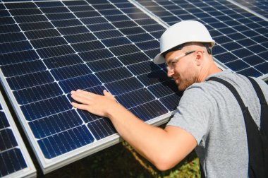 A man working at solar power station