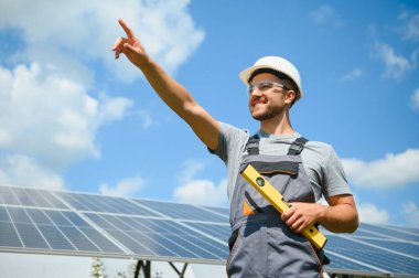 A man working at solar power station