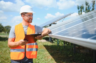 A man working at solar power station