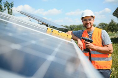 A man working at solar power station