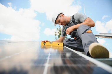 A man working at solar power station