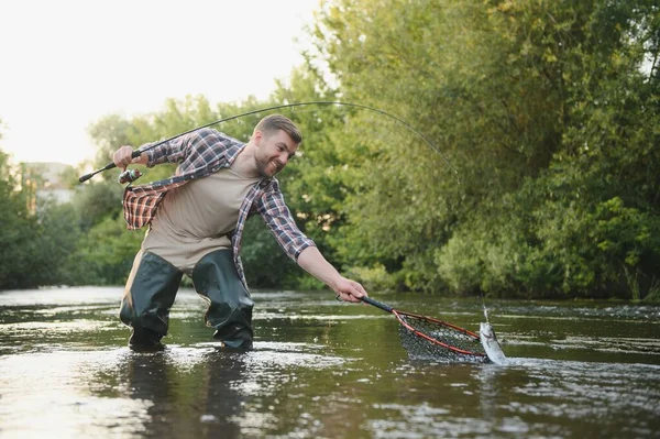 Fisherman Catches Trout River Summer — ストック写真