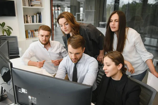 Corporate business team and in a meeting at modern office with big windows . High quality photo.