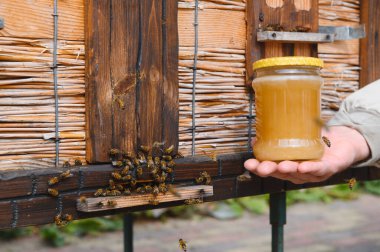 jar of fresh honey in a glass jar. Beekeeping concept. Top view. Copy space
