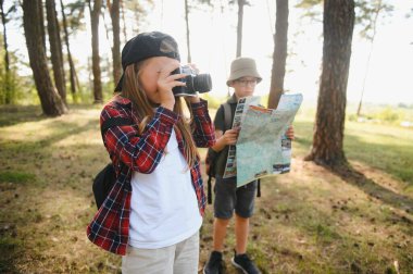 kids scouts in the forest