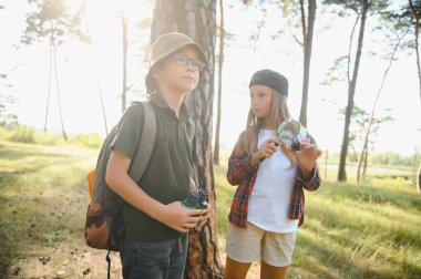 kids scouts in the forest