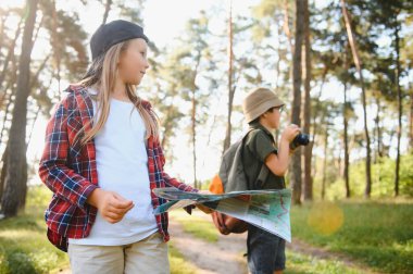 kids scouts in the forest