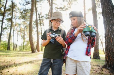 kids scouts in the forest