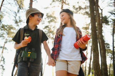 kids scouts in the forest