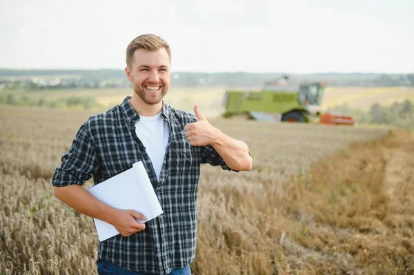 Handsome Farmer Tablet Standing Front Combine Harvester Harvest Field — Stock Photo, Image