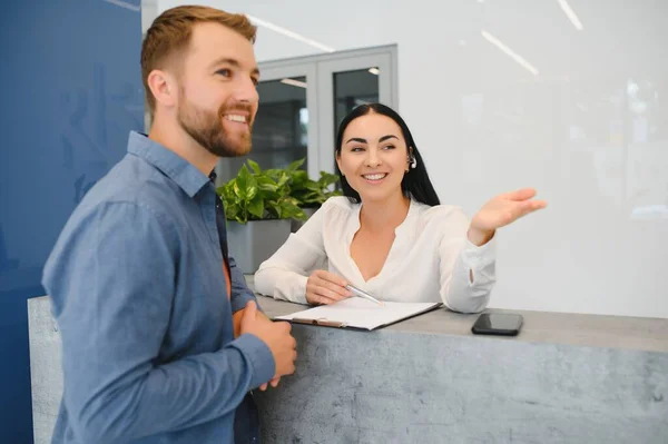 Excellent service. Nice friendly woman talking to the client while standing at the reception