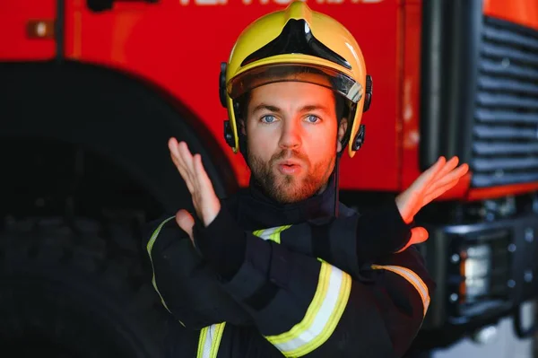 Brave Young Fireman Wearing Protective Uniform — Stock Photo, Image