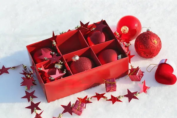 Christmas decorations in the snow — Stock Photo, Image