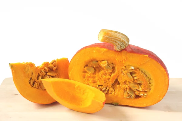 Hokkaido pumpkin on a cutting board — Stock Photo, Image