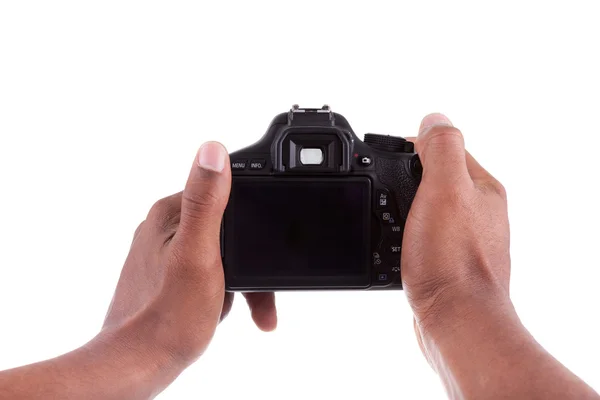 African american photographer holding a digital camera — Stock Photo, Image