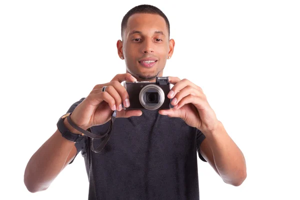 Retrato de un joven afroamericano sosteniendo y tomando un pi — Foto de Stock